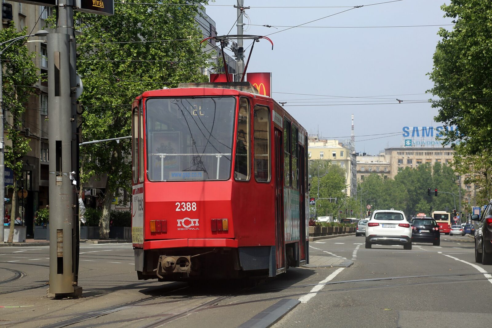 A city tram running along a street in central Belgrade