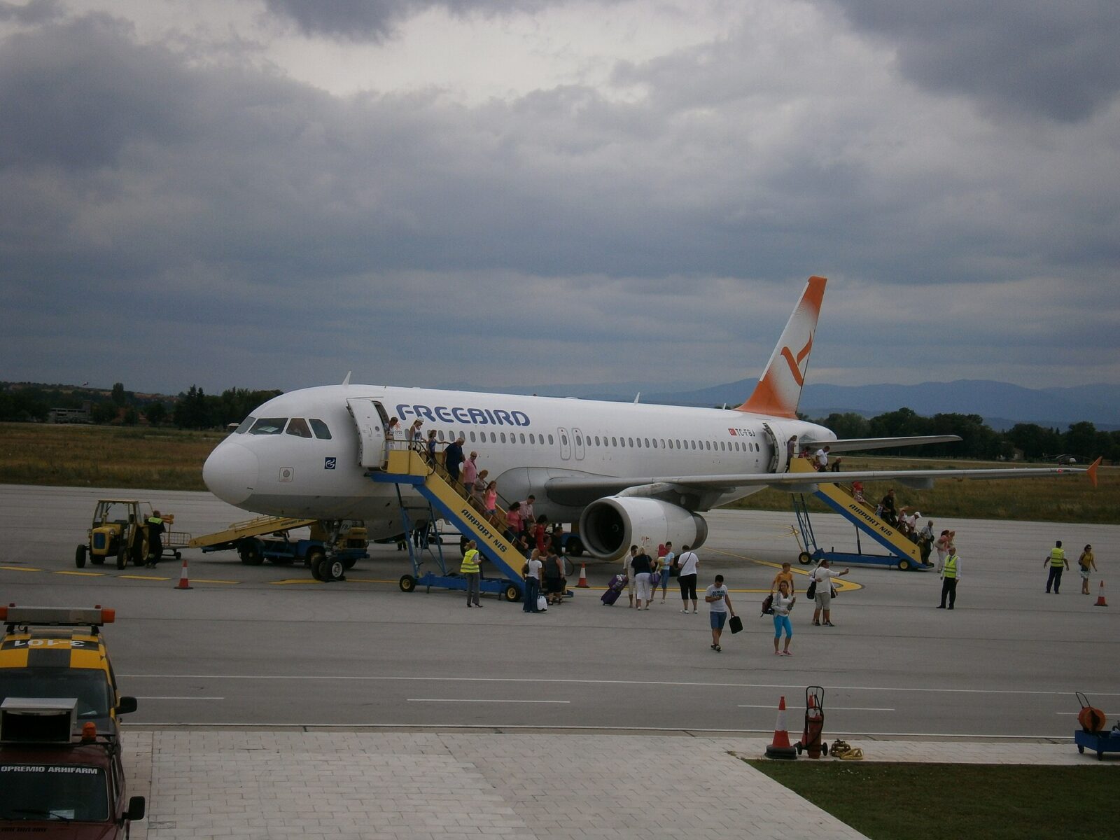 A Freebird Airlines charter aircraft on the tarmac at Nis, the kind of seasonal charter flight that runs to Antalya
