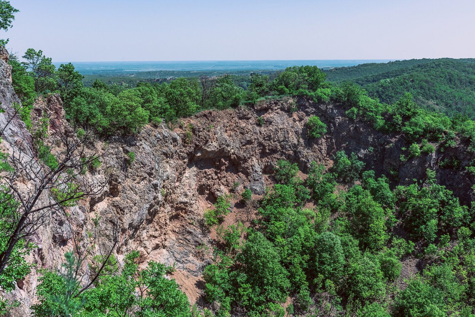A wide view over the plain from a hillside viewpoint on Fruska Gora