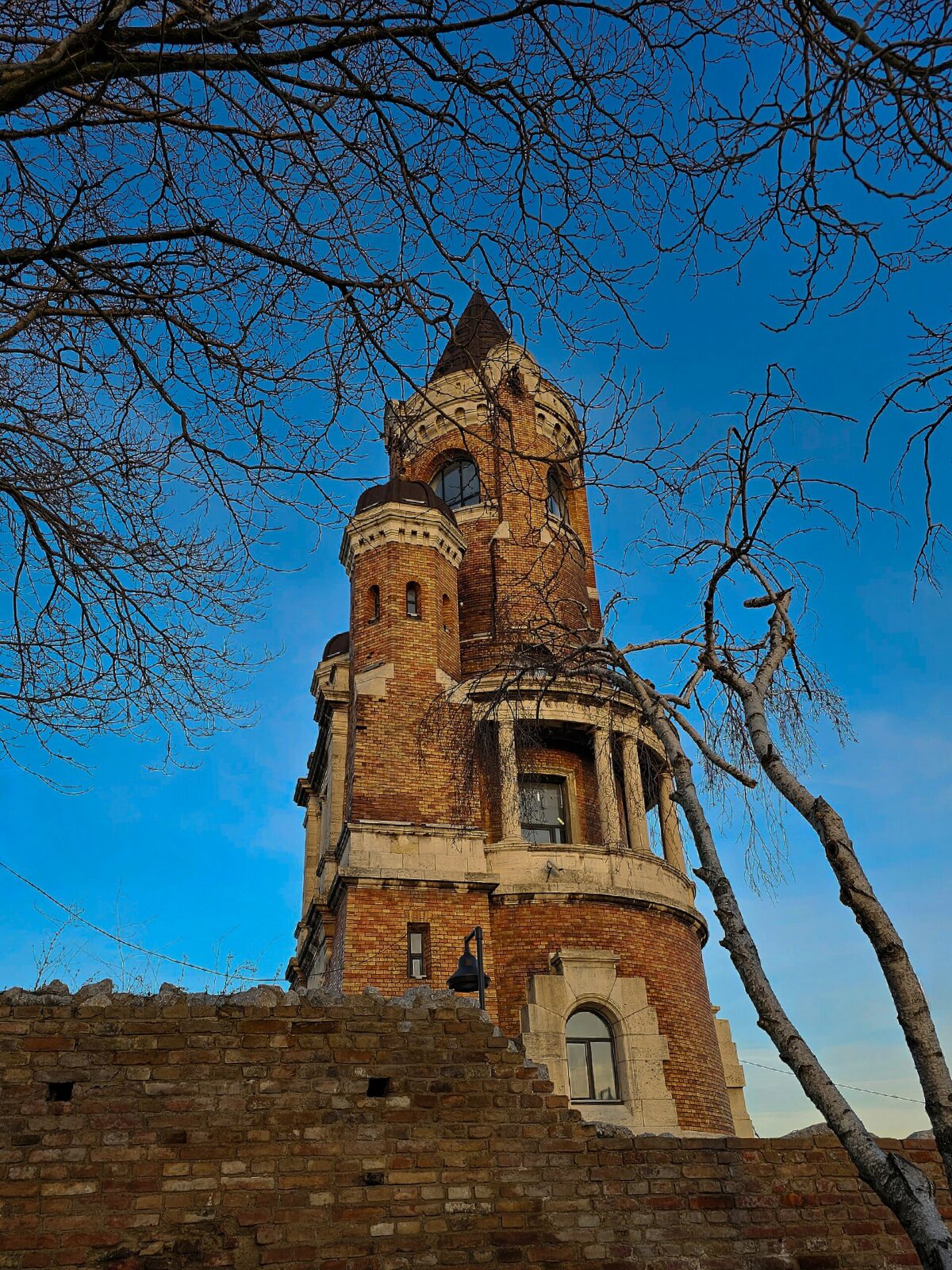 The Millennium Tower rising above a section of Gardos hill's old fortification wall