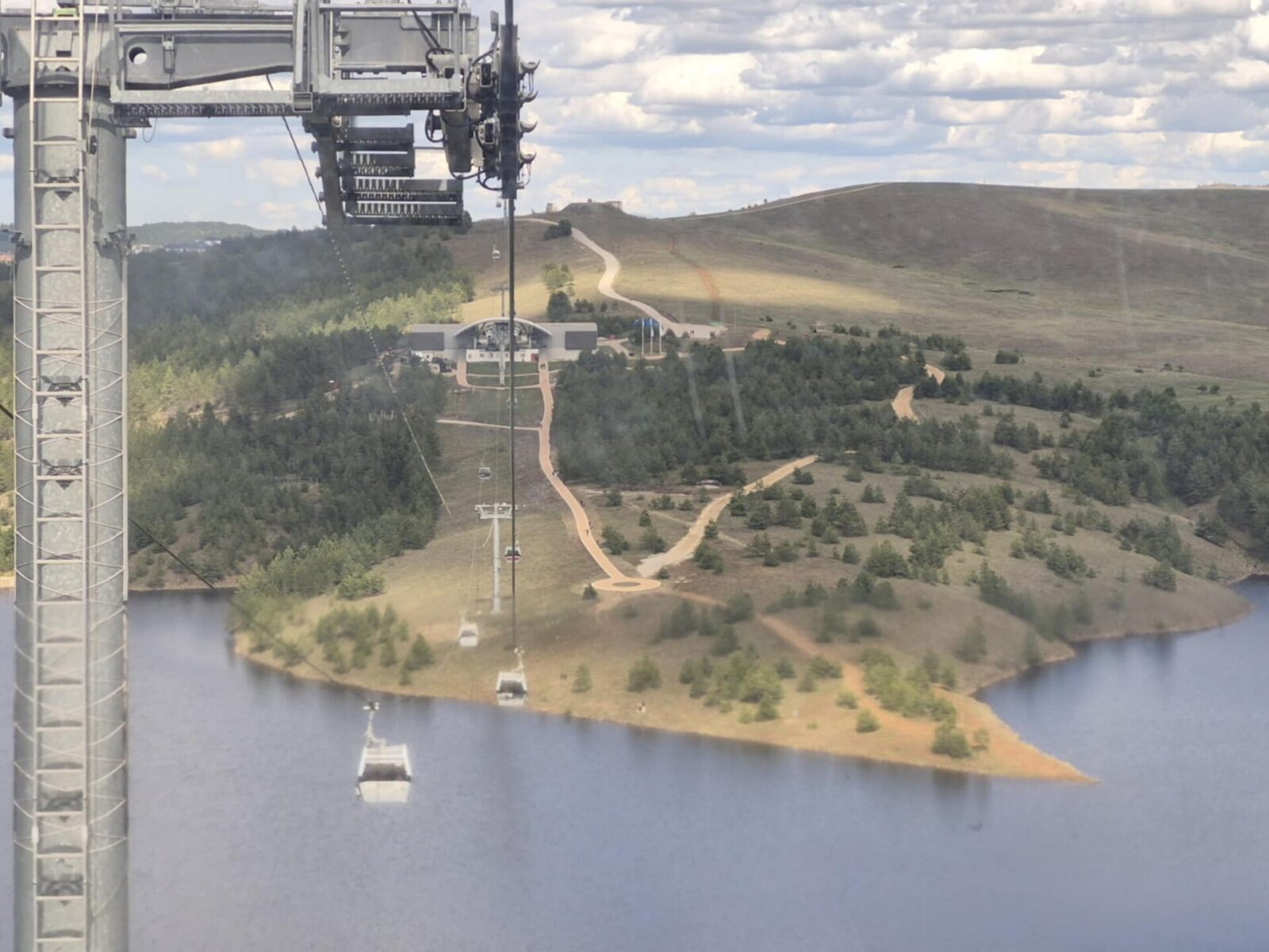 Cabins of the Gold Gondola on the cable line above Zlatibor, heading toward Tornik