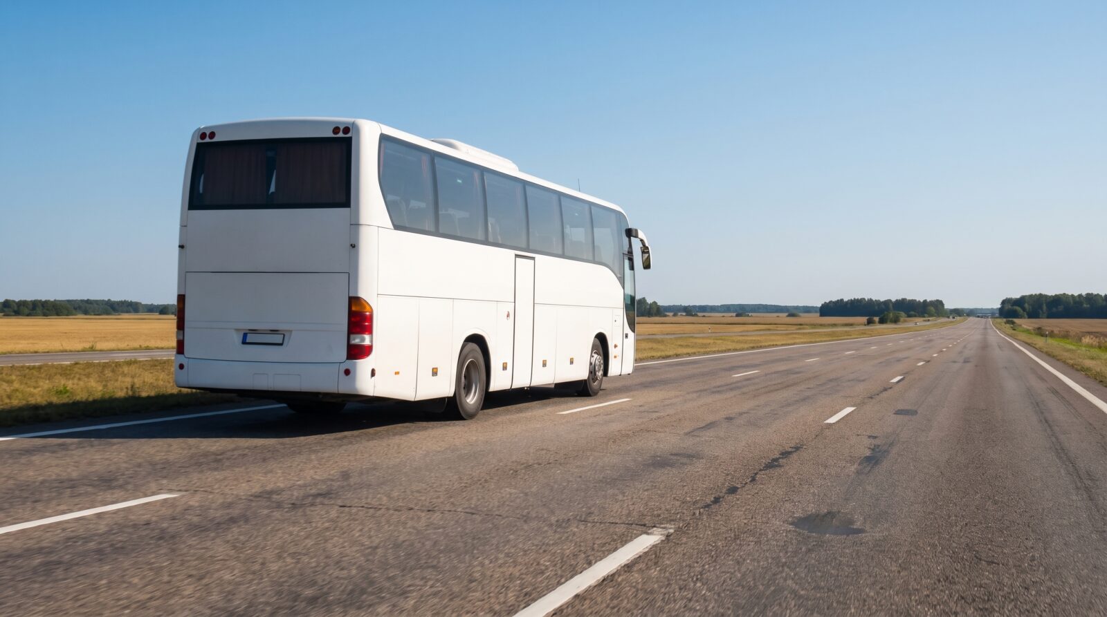 A long-distance coach travelling along a highway