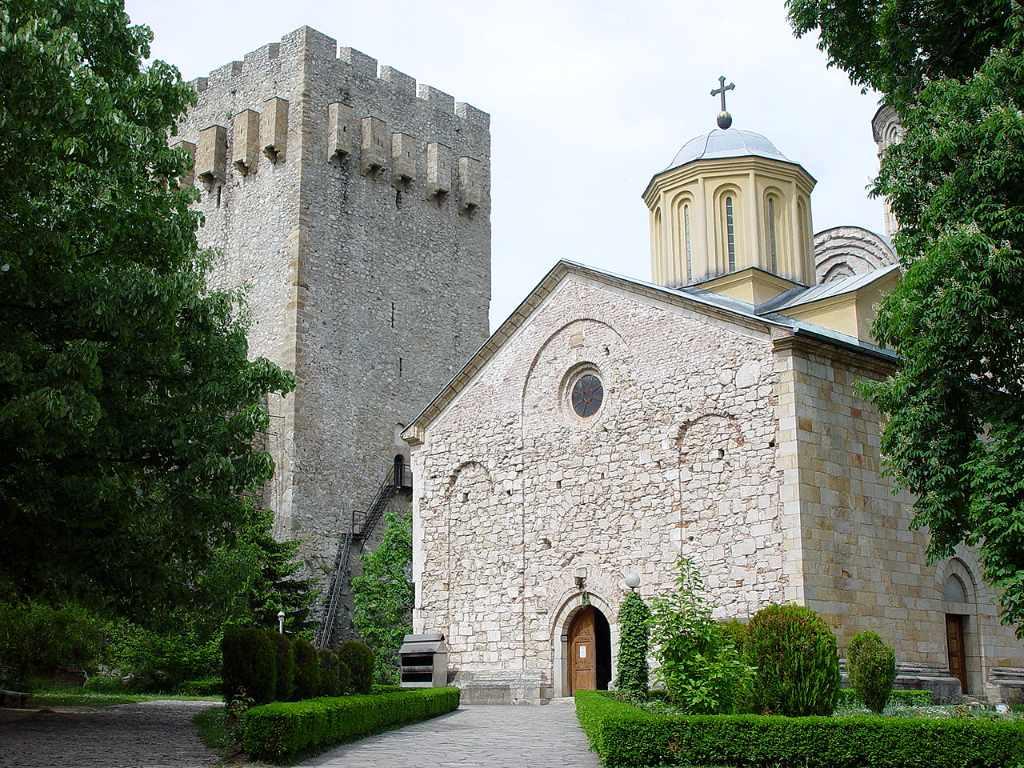 The Church of the Holy Trinity standing beside one of Manasija's fortified towers