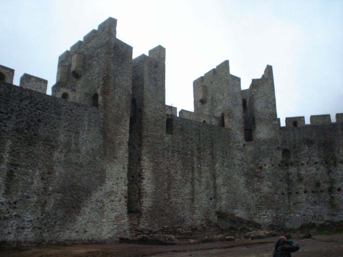 Crenellated towers along Manasija's fortified perimeter wall, seen from within