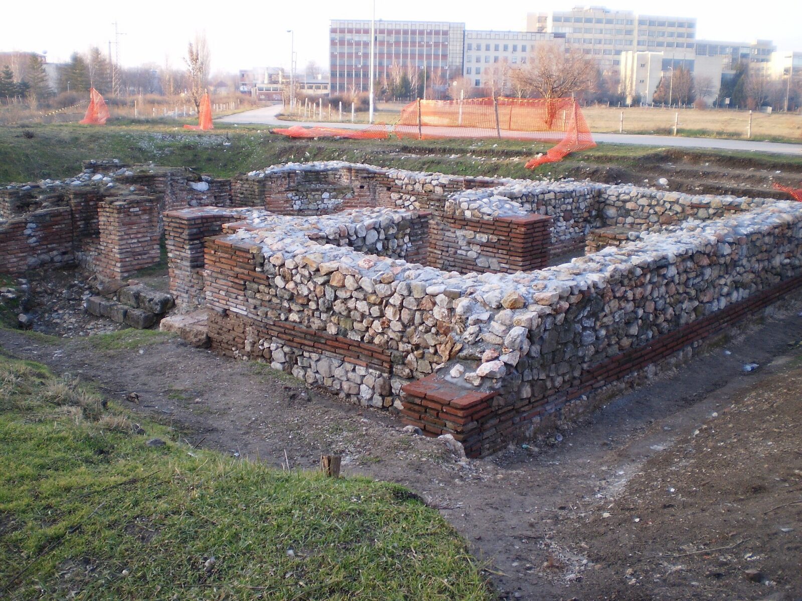 Excavated stone and brick foundations of the villa with an octagonal tower at Archaeological Park Mediana