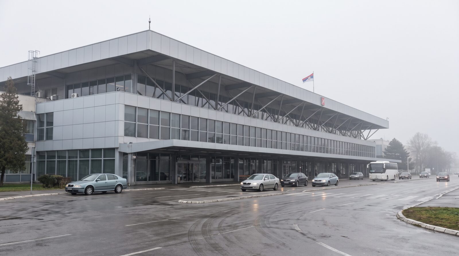 The terminal building at Nikola Tesla Airport in Belgrade, seen from the approach road