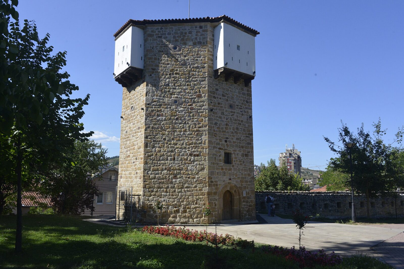 Kula motrilja, the stone watchtower of Novopazarska tvrđava, set within a small park