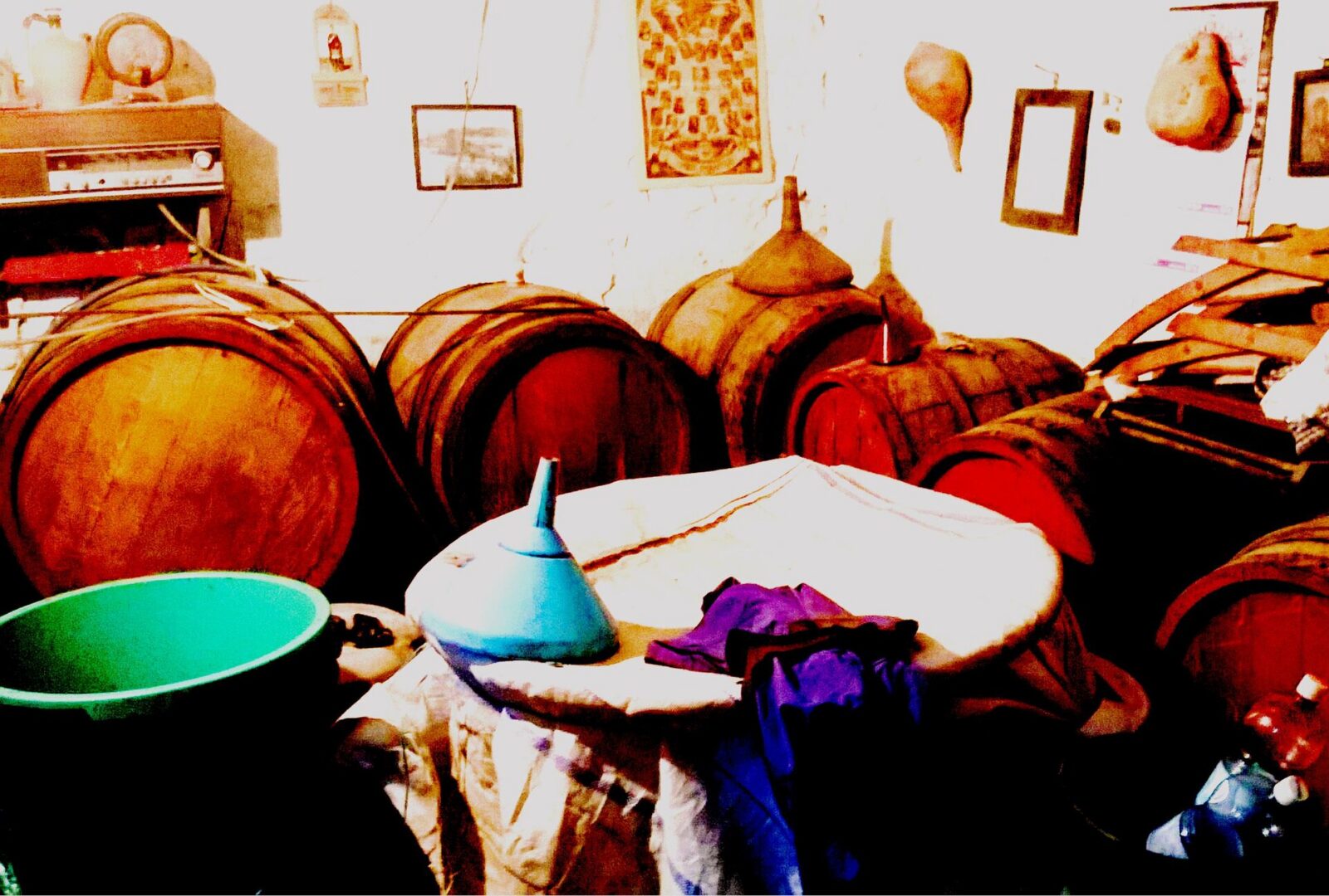 Wooden barrels used for aging rakija in a cellar