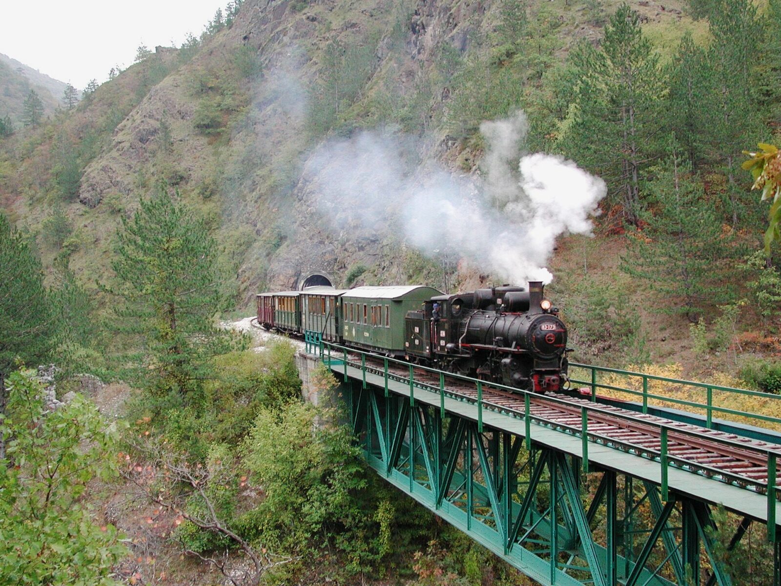A train on the Sarganska osmica narrow-gauge railway near Mokra Gora