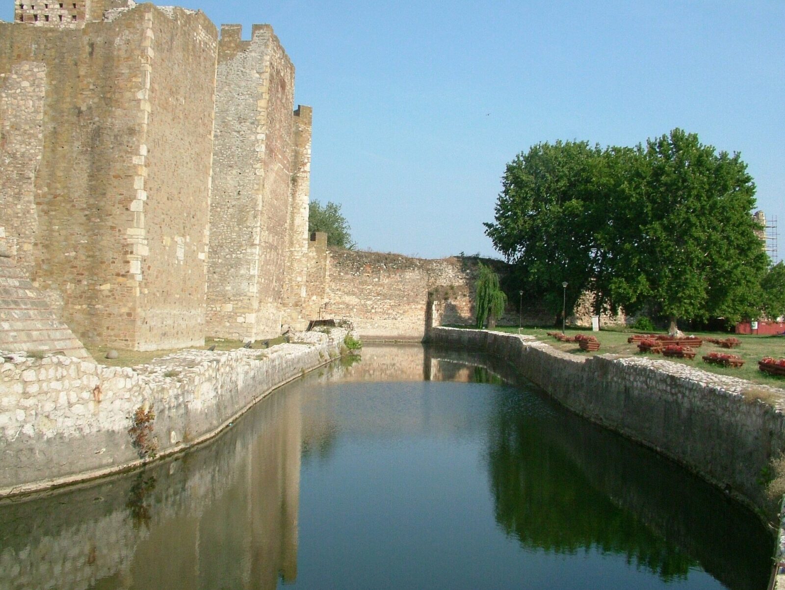 Smederevo Fortress's walls and towers reflected in its moat
