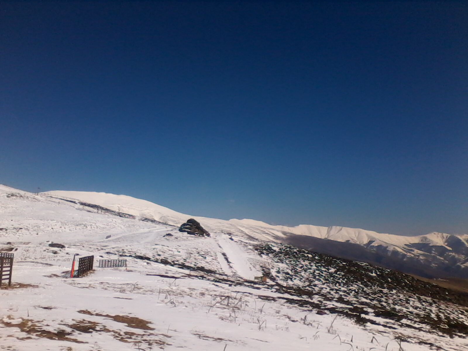 A ski slope thawing at Jabucko Ravniste, the resort's lower sector