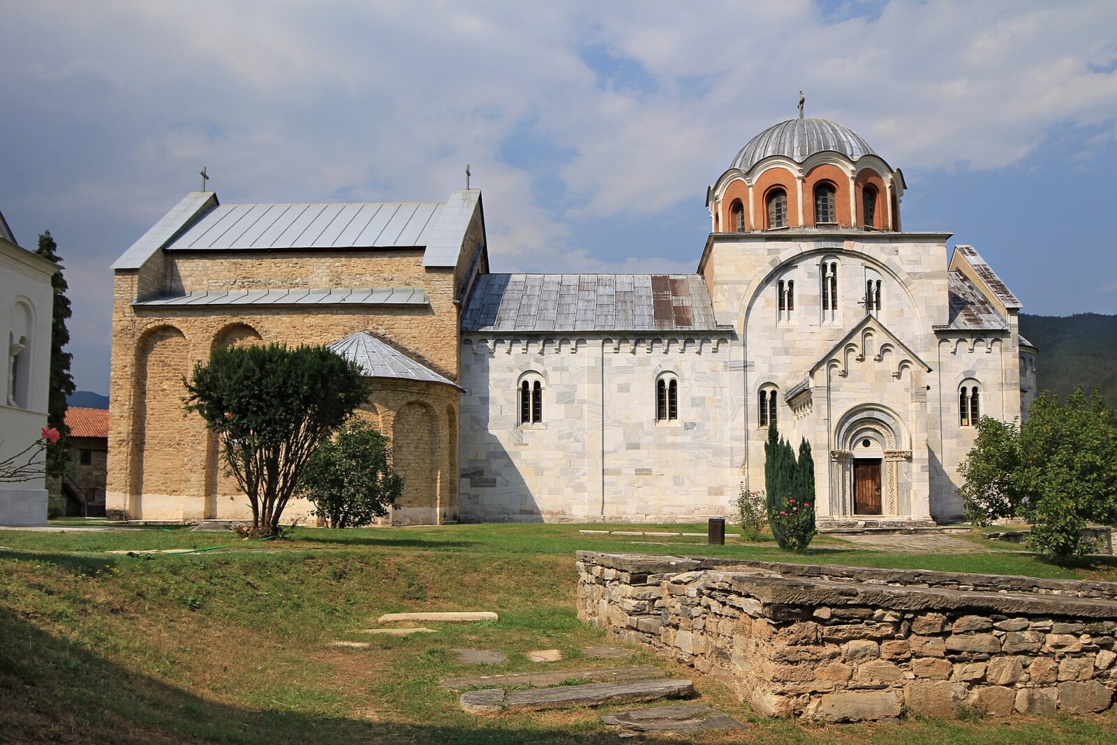 The white marble Church of the Virgin at Studenica, with its domed tower and monastery walls