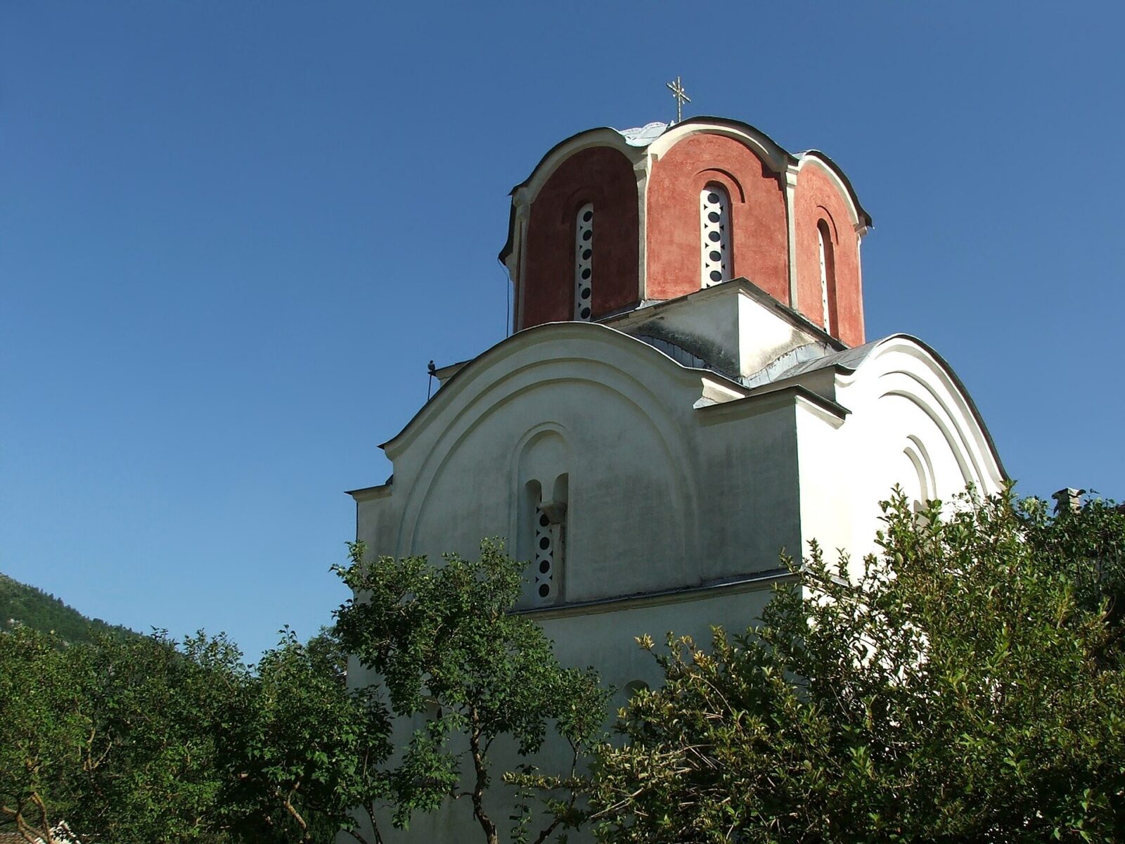 The domed tower of the King's Church at Studenica, seen against a clear sky