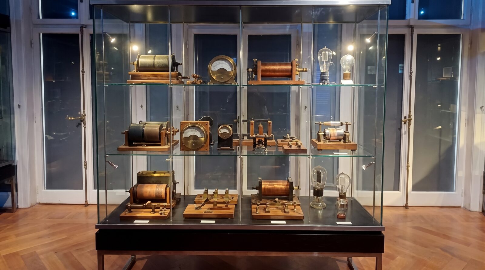 A historic electrical apparatus from the Nikola Tesla Museum's collection, displayed on a plinth