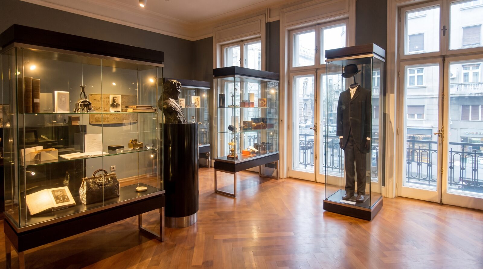 One of the exhibition rooms inside the Nikola Tesla Museum, lined with display cases