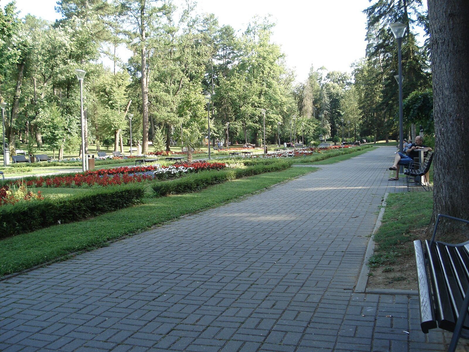 Vrnjacka Banja's central park, laid out with flower beds and paths